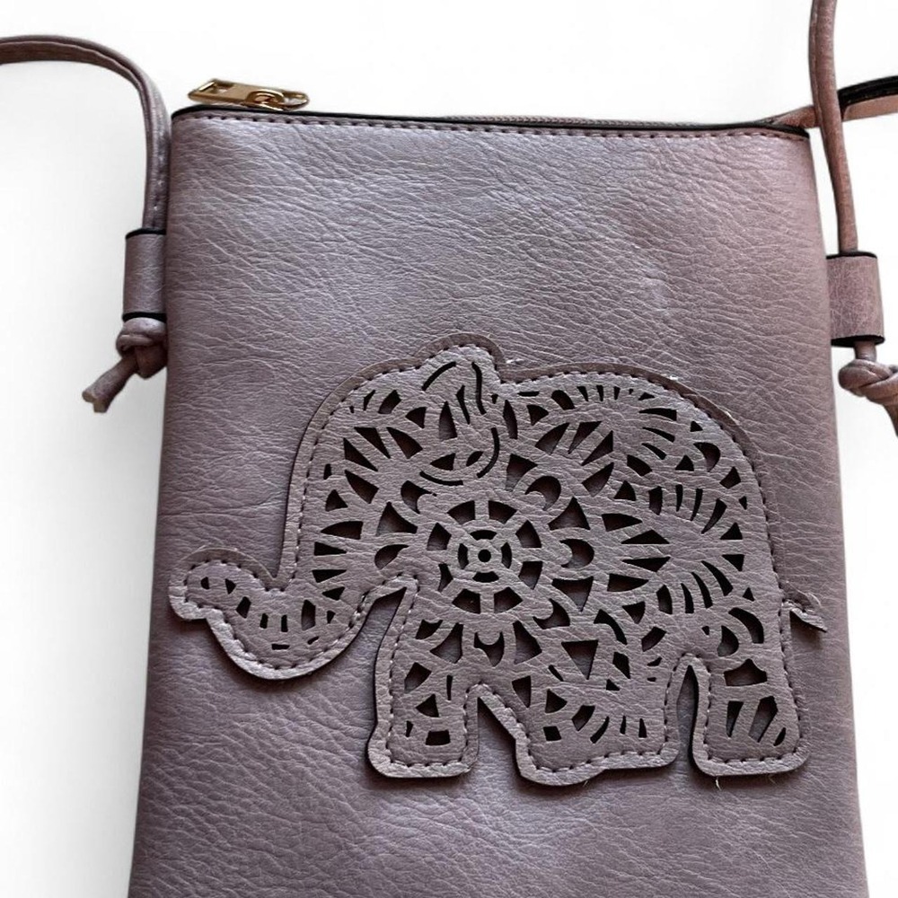 Lavender color crossbody bag with 24" drop strap, zipper closure.